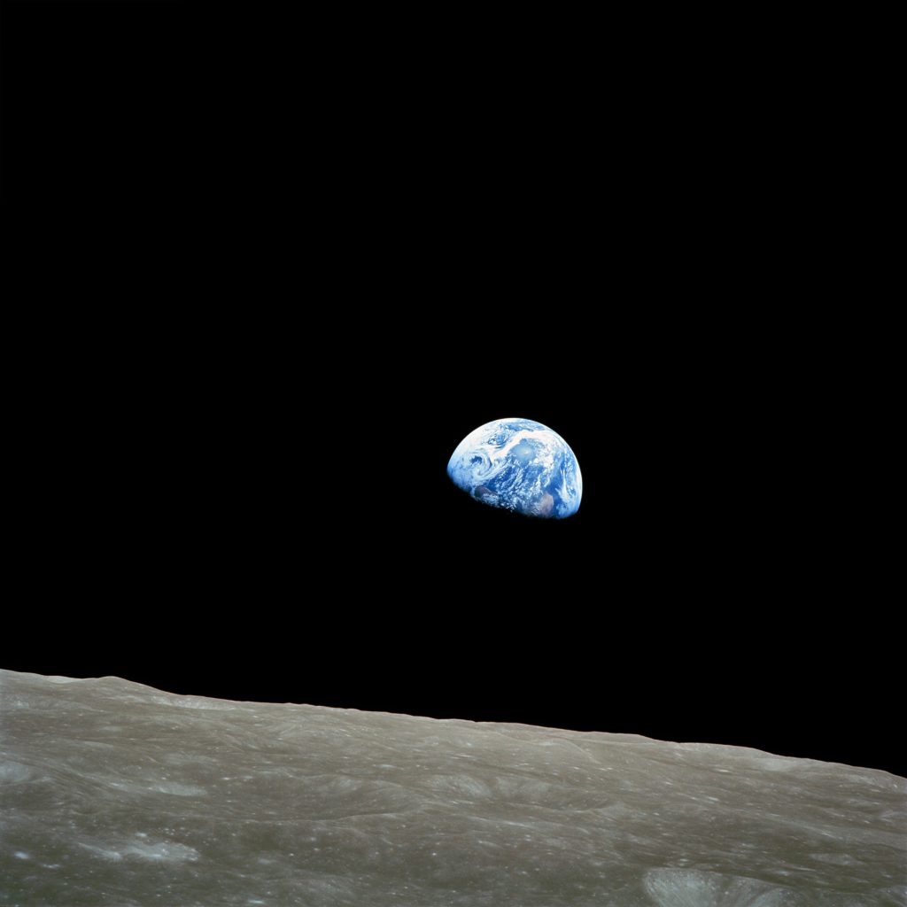 View of the Earth rising over the lunar surface, taken by William Anders on board Apollo 8.